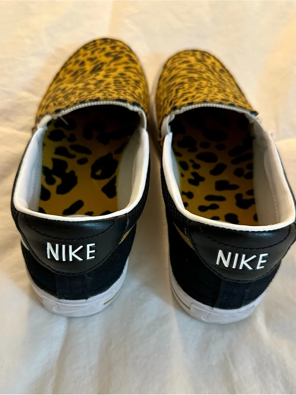 Nike Court Legacy Slip-On Sneakers in Yellow and Black Leopard Print